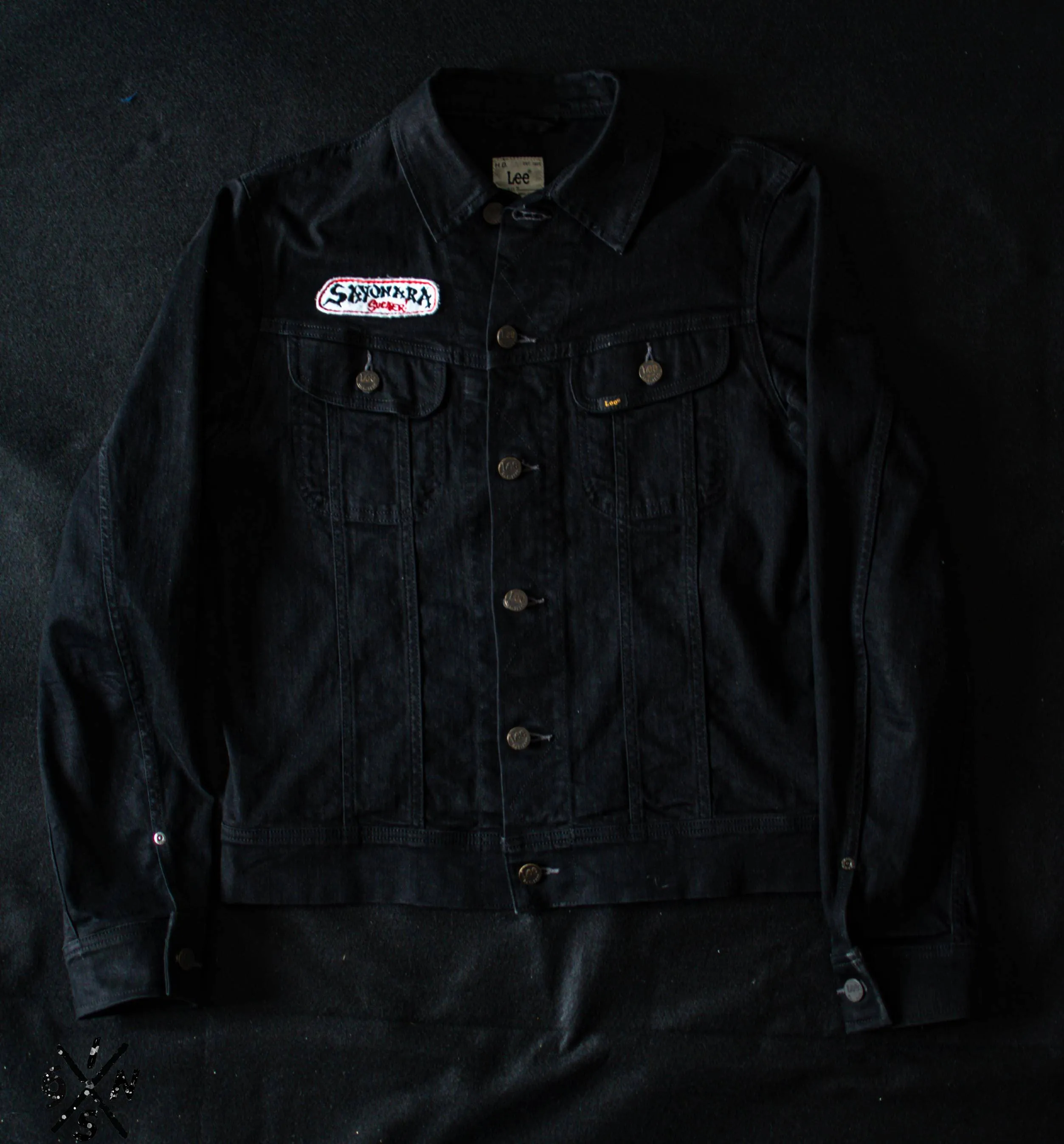 Black denim Lee Riders jacket hand embroidered.