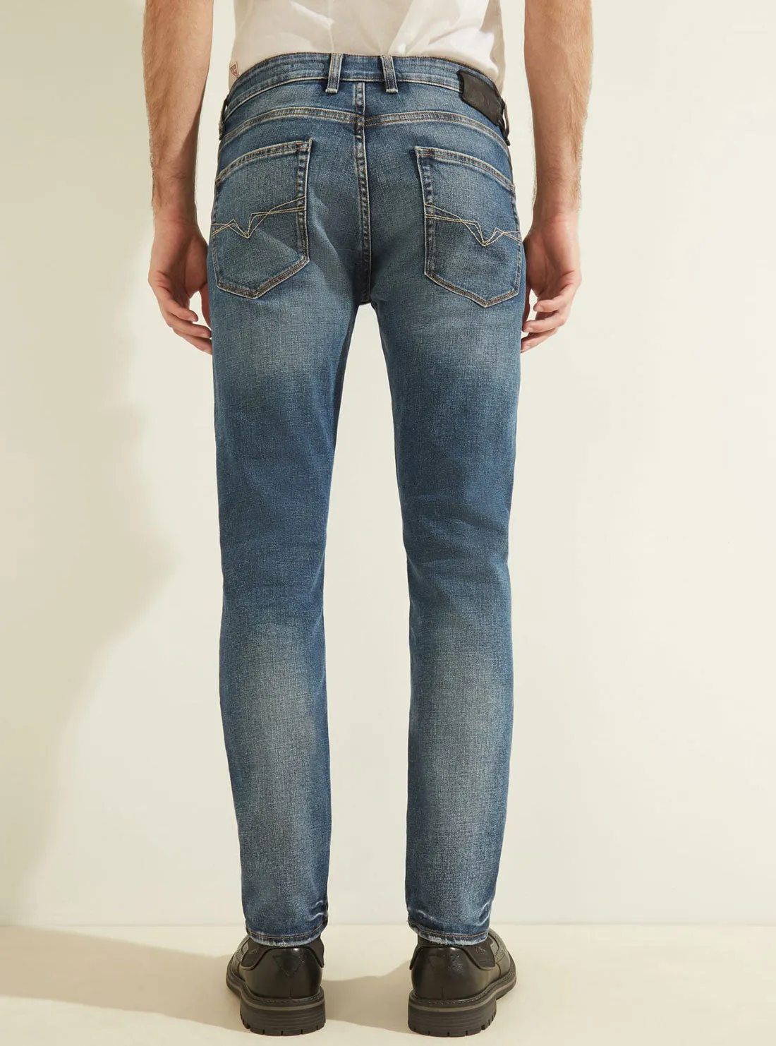 Low-Rise Slim Straight Denim Jeans in Stratus Blue Wash